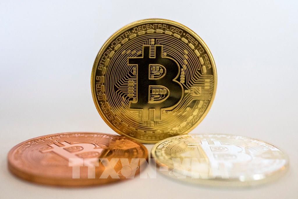 Đồng tiền mã hóa bitcoin. (Ảnh: AFP/TTXVN) Đồng tiền mã hóa bitcoin. (Ảnh: AFP/TTXVN)